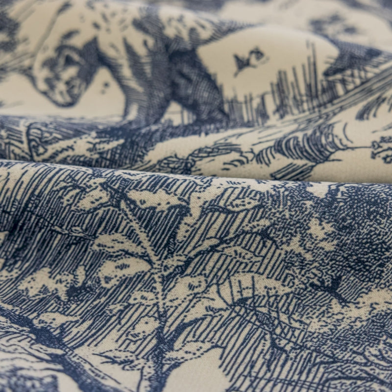 a close up of a blue and white fabric