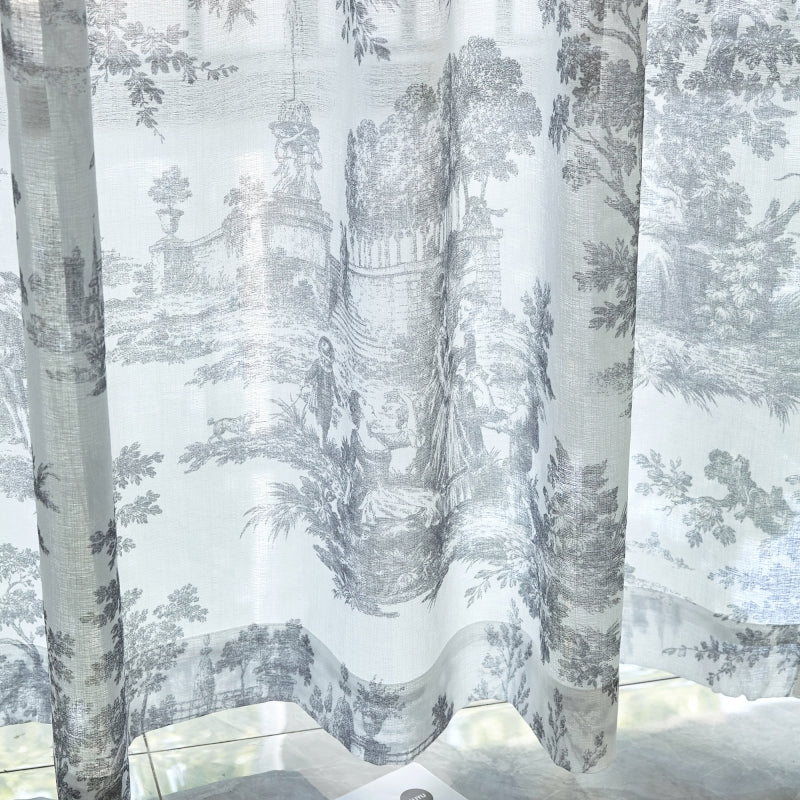 a curtain with a picture of a castle on it