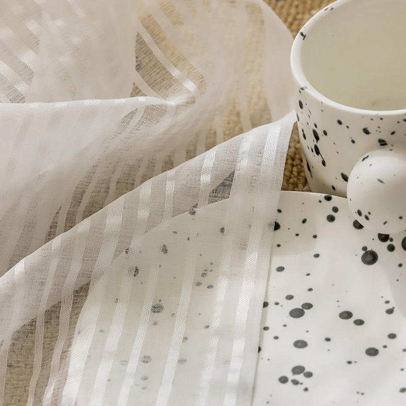 a coffee cup sitting on top of a table