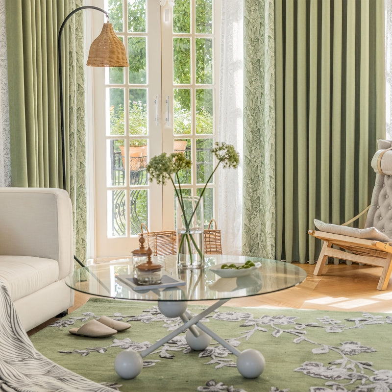 a living room filled with furniture and a large window