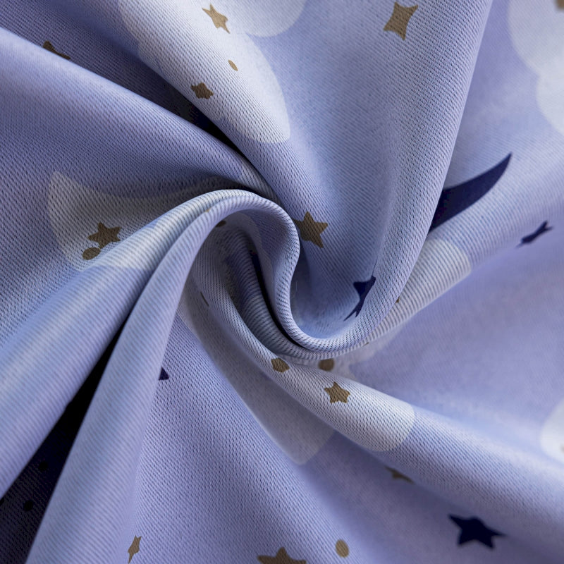 a blue fabric with gold stars on it
