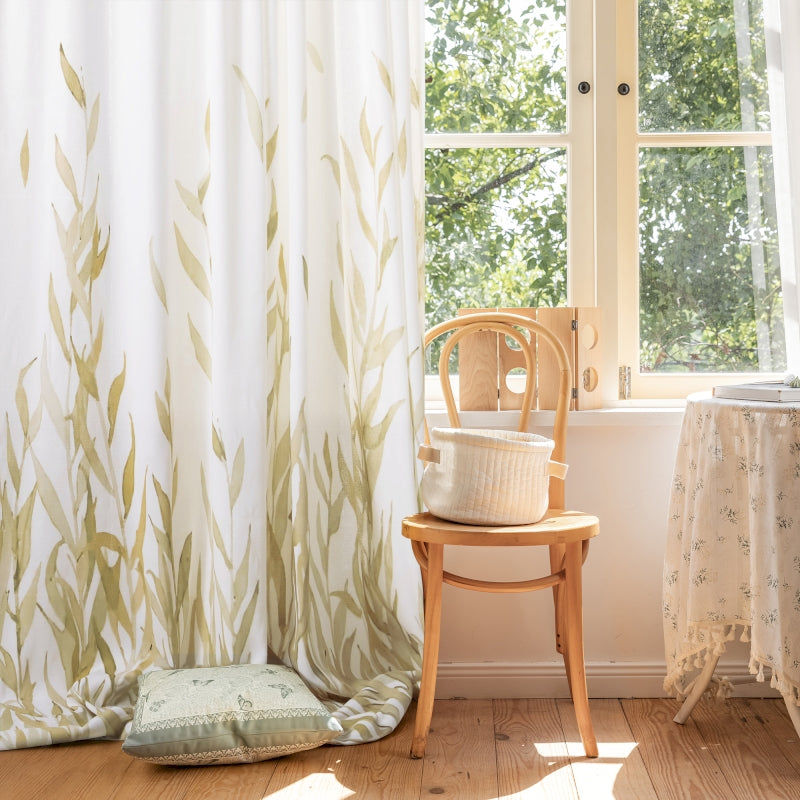a chair sitting next to a window in a room