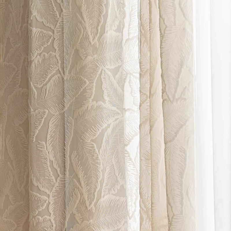a close up of a curtain with a white background