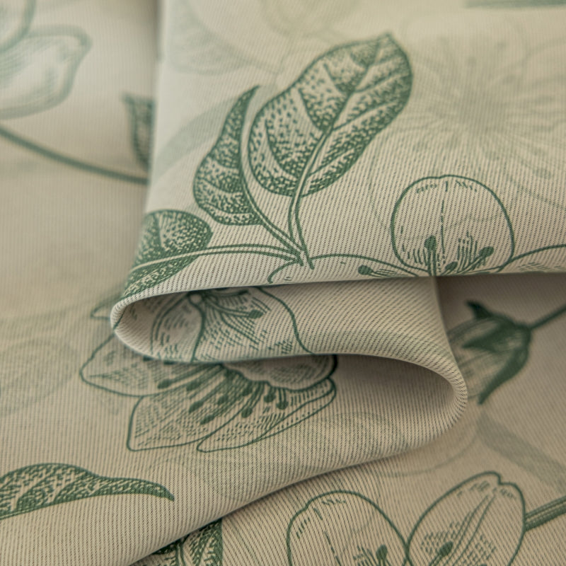 a close up of a fabric with flowers on it