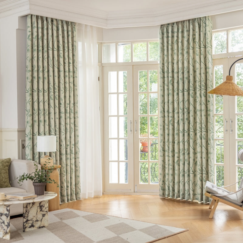 a living room filled with furniture and a large window