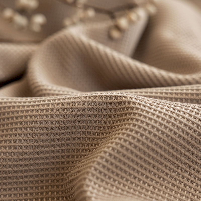 a close up of a fabric with a pattern