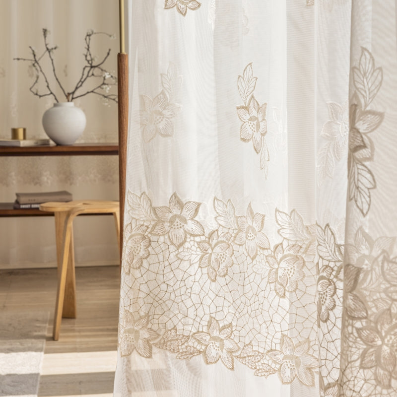 a bathroom with a shower curtain and a mirror