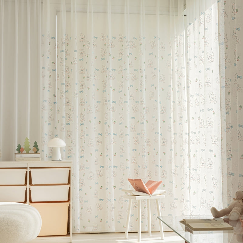 a room with a chair, dresser and a window