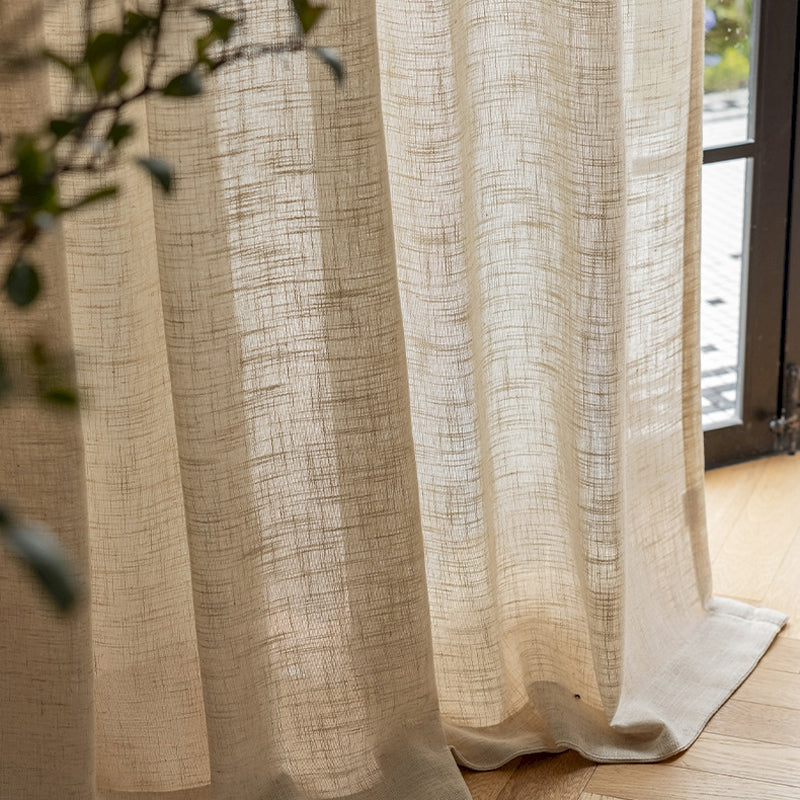 a close up of a curtain on a window