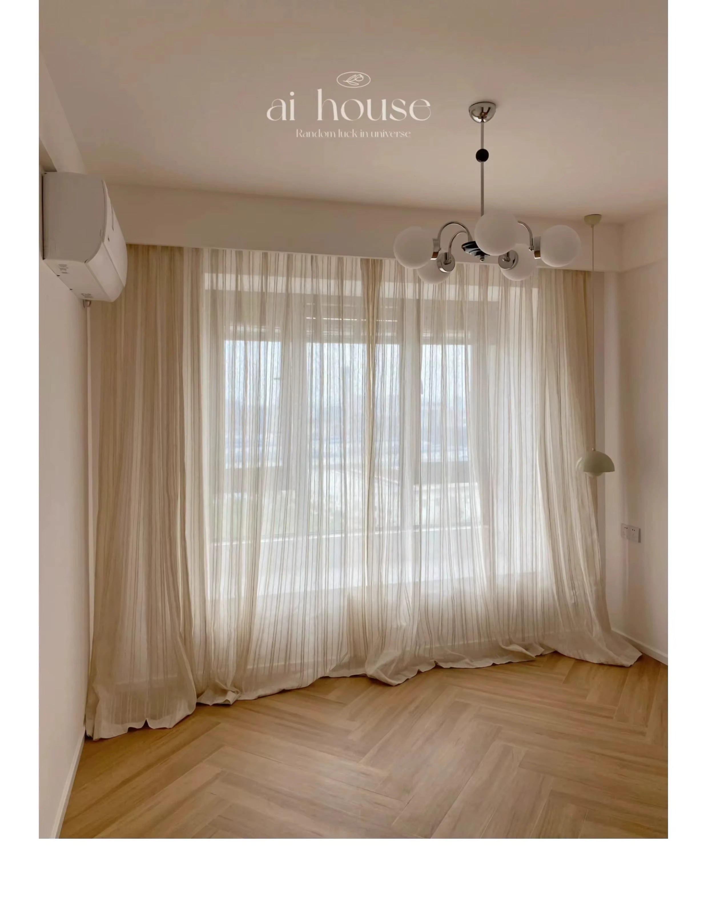 a living room with a large window and a wooden floor