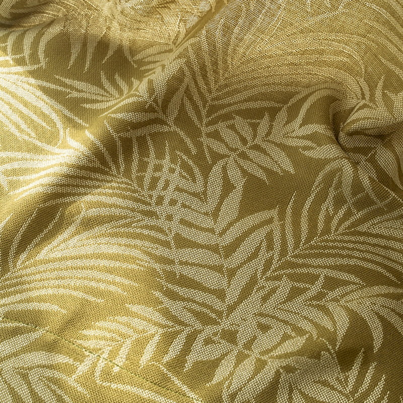 a close up of a fabric with a leaf pattern
