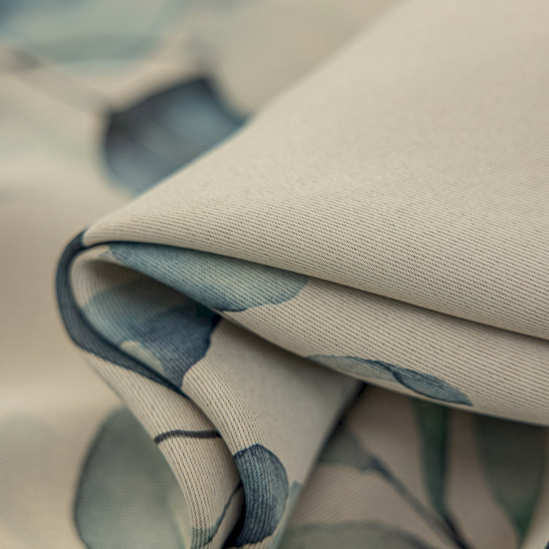 a close up of a fabric with a flower pattern
