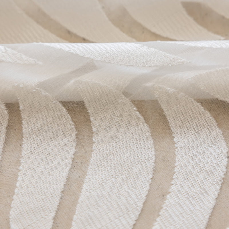 a close up of a white fabric with wavy lines