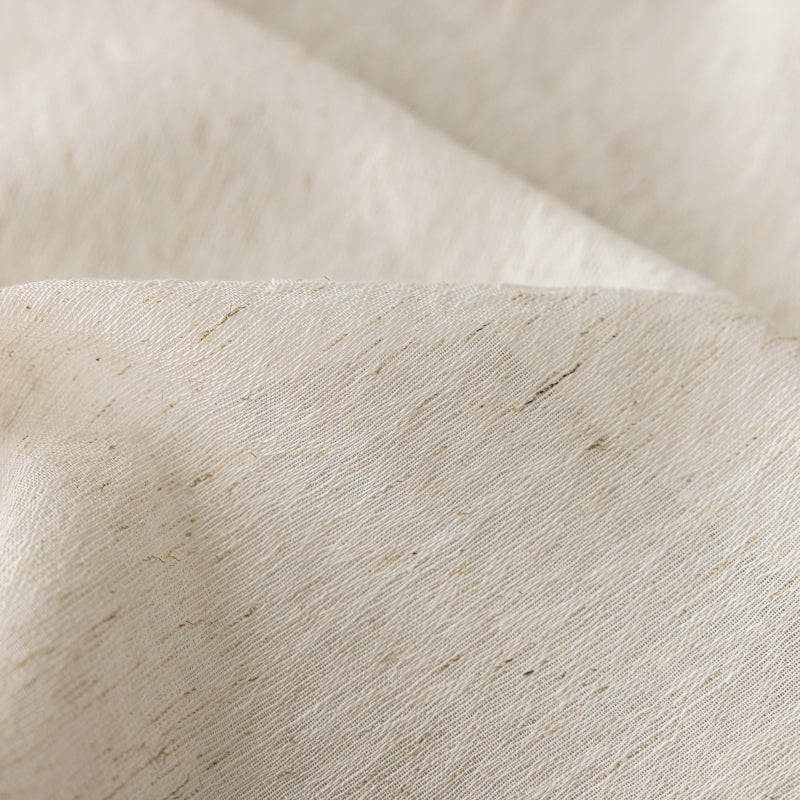 a close up view of a white fabric