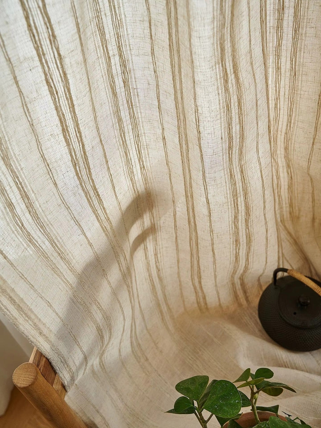 a potted plant sitting on top of a wooden table