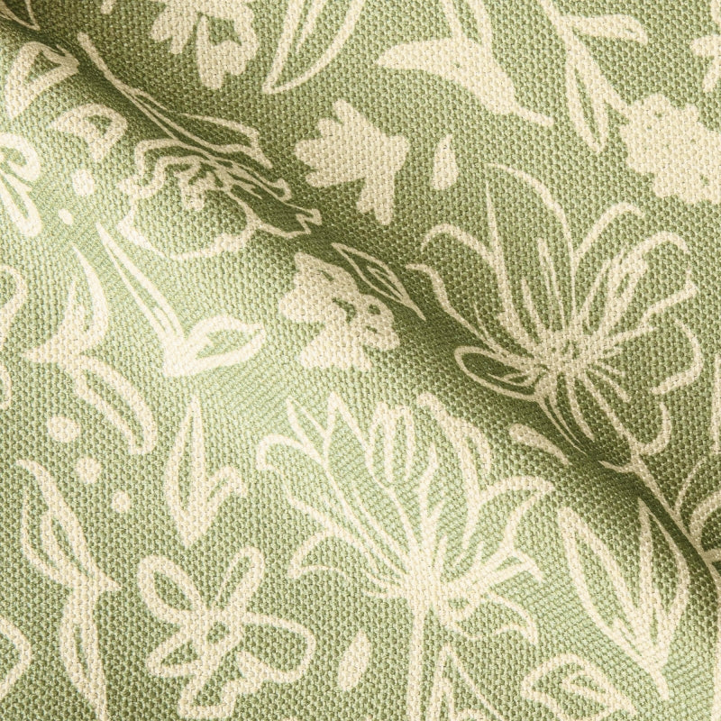 a close up of a green and white fabric