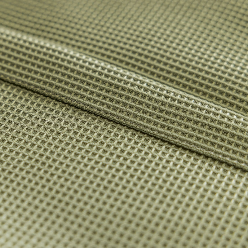 a close up view of a green fabric