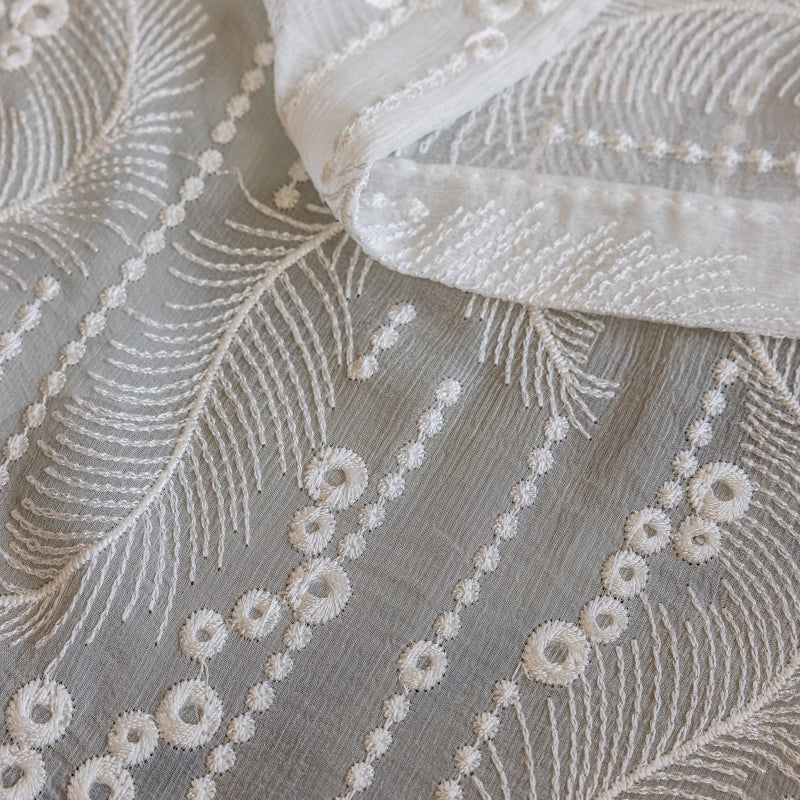 a close up of a piece of cloth with a design on it