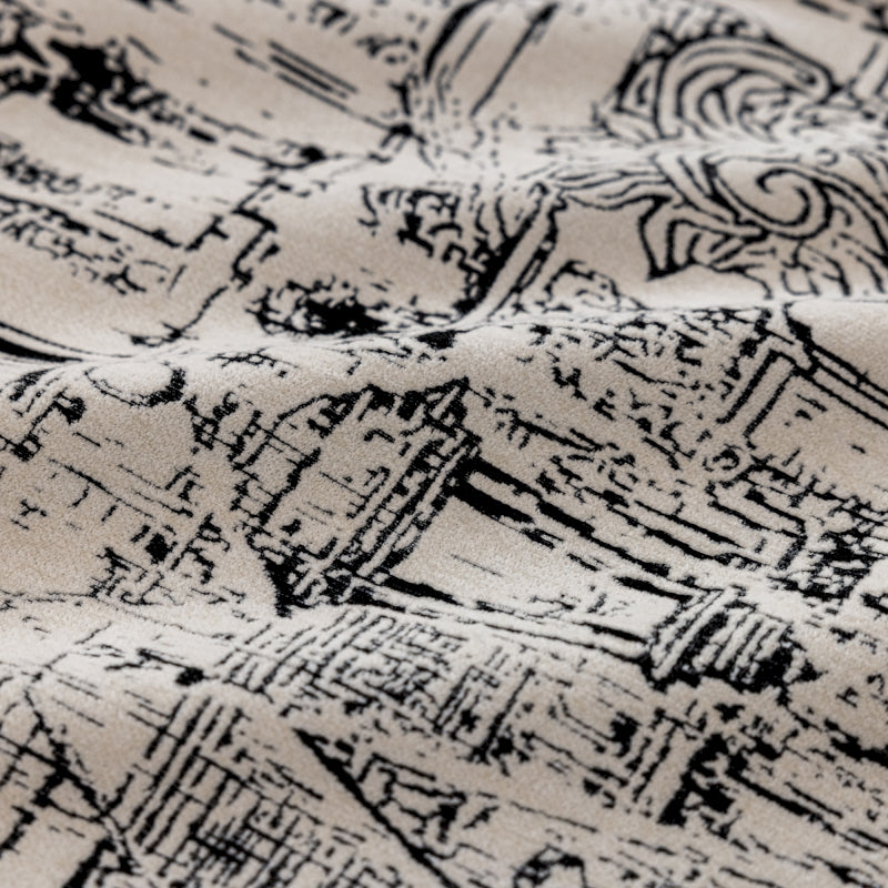 a black and white photo of a piece of fabric