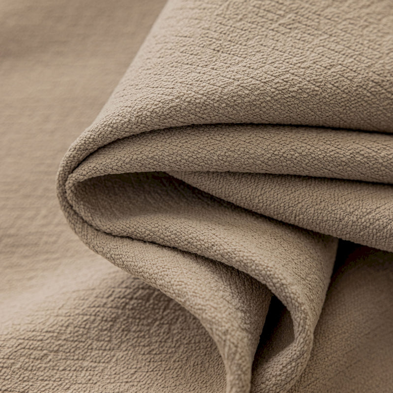 a close up of a tan colored fabric
