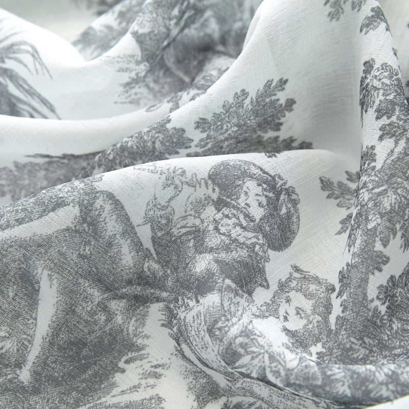 a close up of a white and black fabric