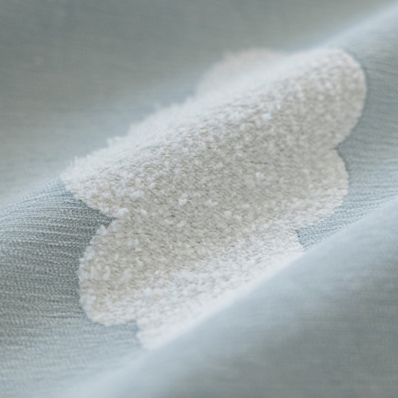 a close up of a white substance on a blue cloth