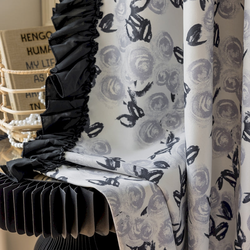 a close up of a curtain with a chair in the background