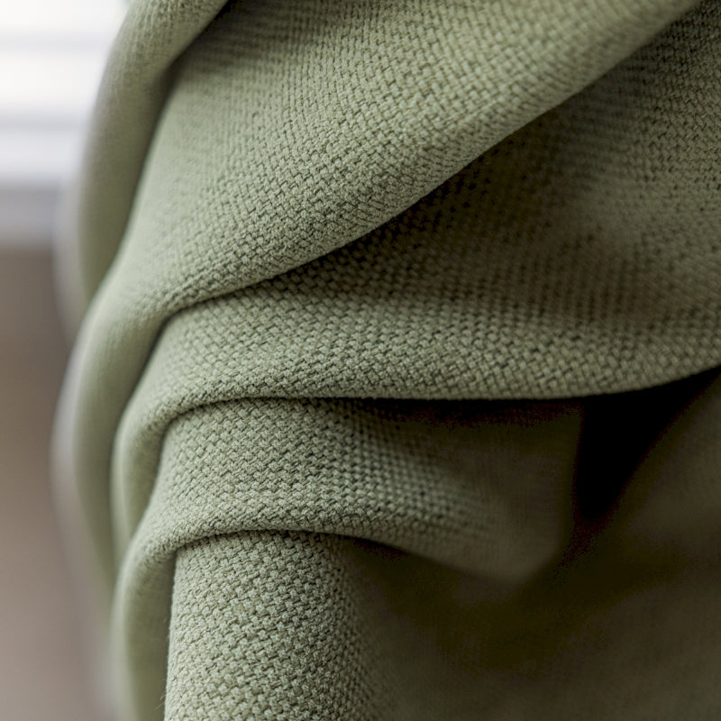 a close up view of a green cloth