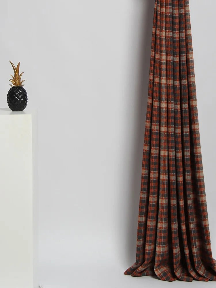 a window curtain with a pineapple on top of it