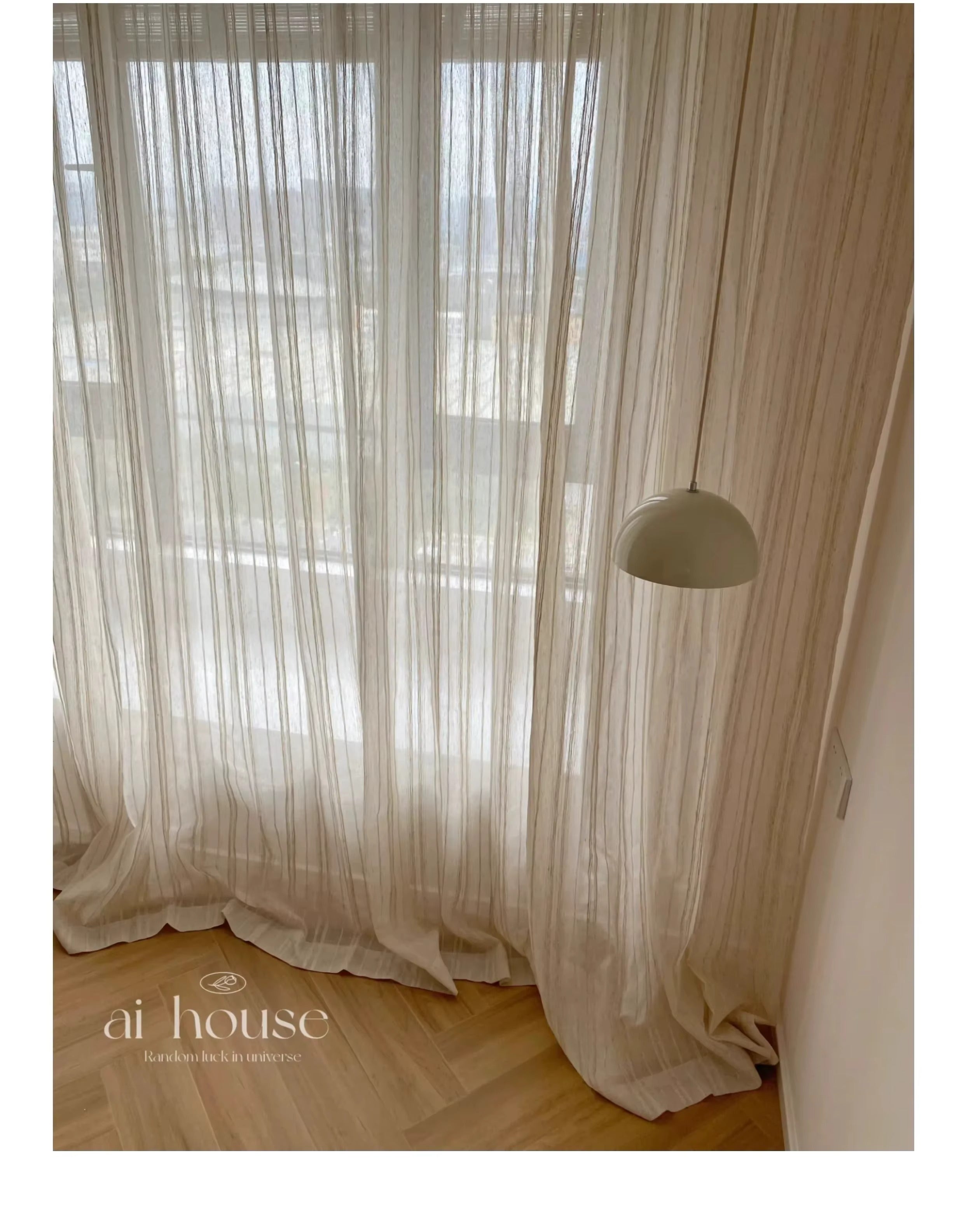 a room with a white curtain and a floor lamp