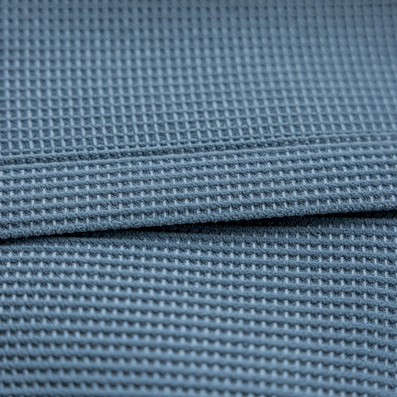 a close up view of a blue fabric