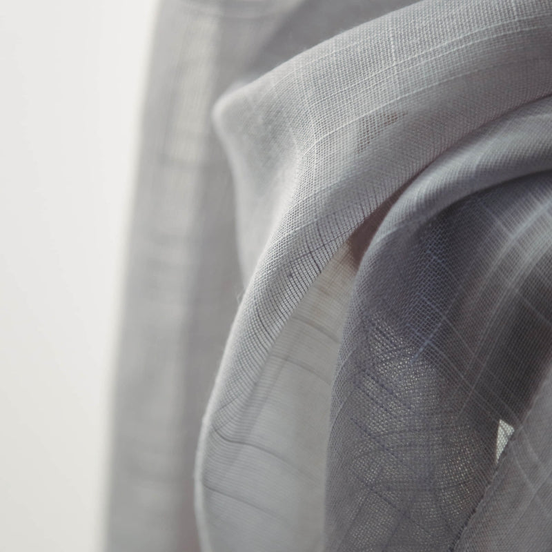 a close up of a gray scarf on a white background