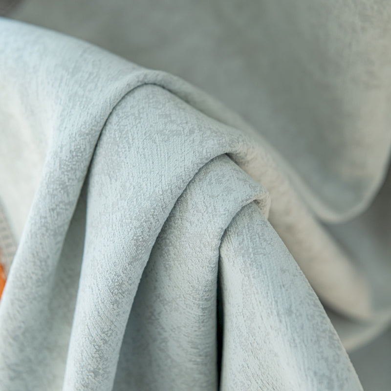 a close up of a white cloth on a chair