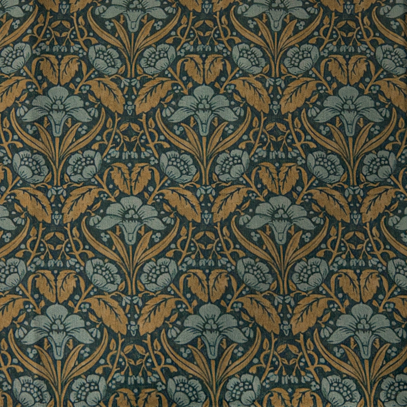 a close up of a blue and gold wallpaper