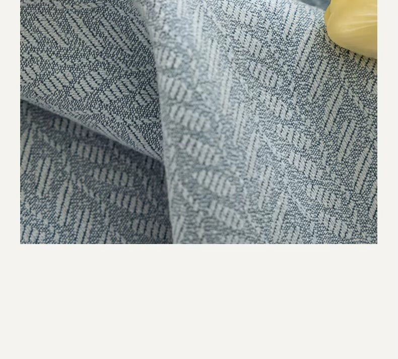 a close up of a blue and white fabric