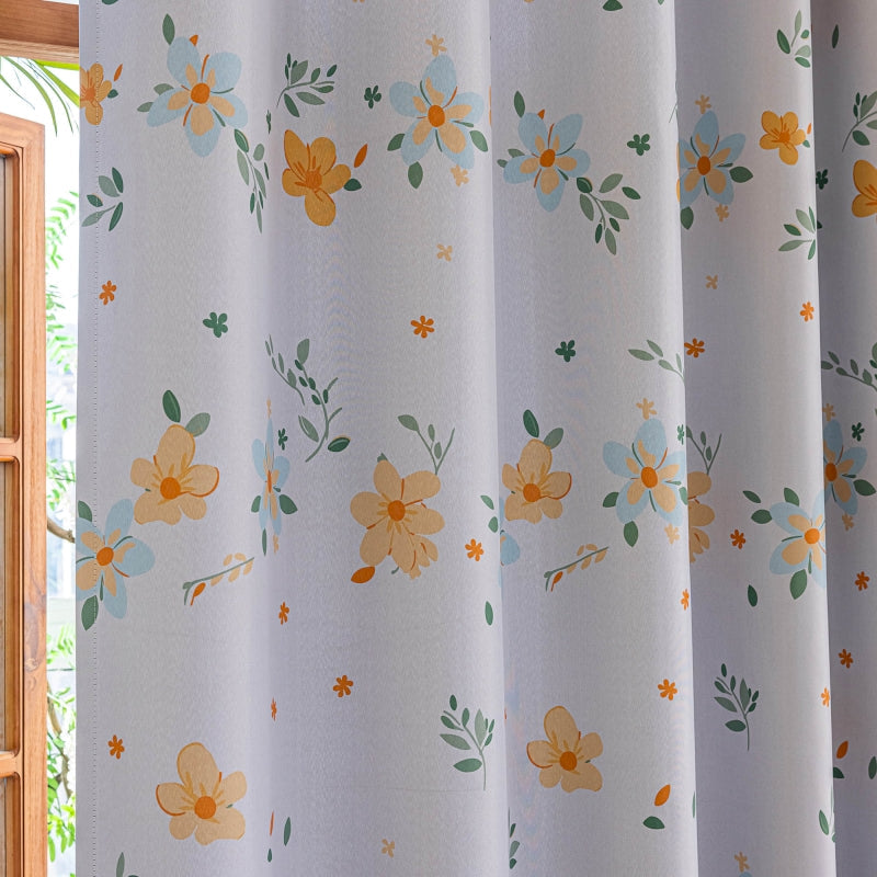 a close up of a curtain with flowers on it