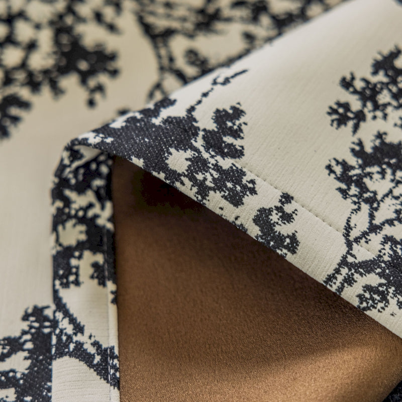 a close up of a black and white fabric