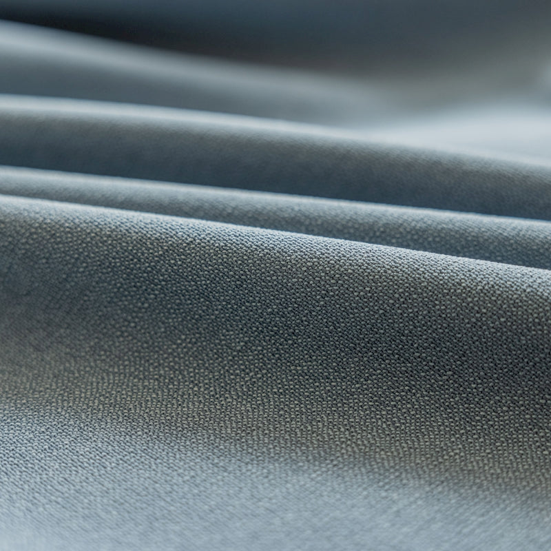 a close up view of a blue fabric