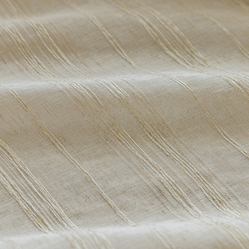 a close up view of a beige fabric