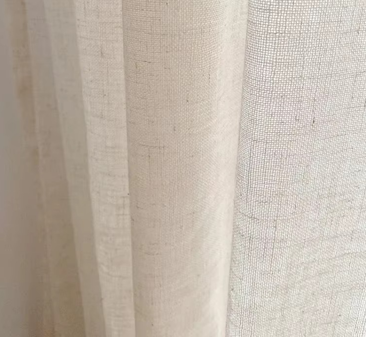 a close up of a curtain with a white background